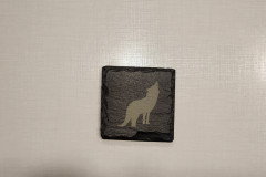 Black slate coaster with wolf silhouette laser engraved