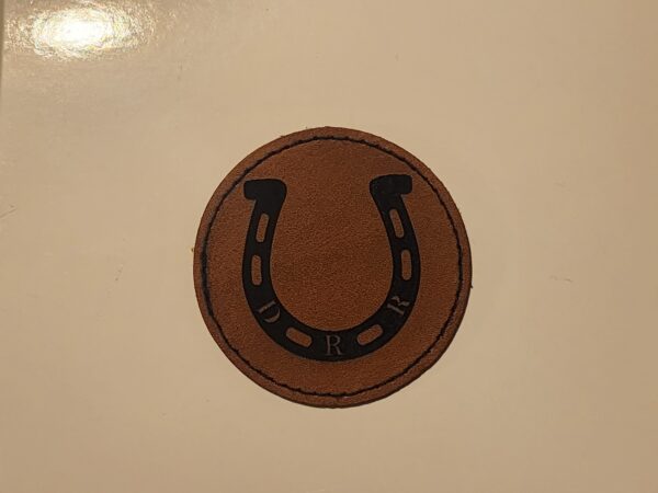 Hat patch featuring company logo