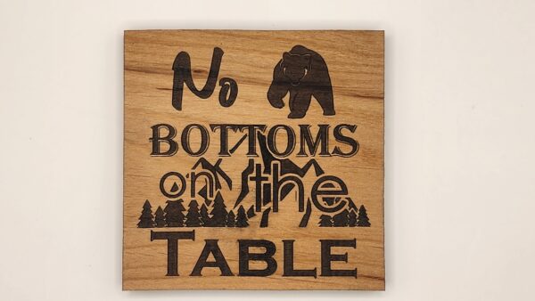 Alder coater featuring "No bear bottoms on the table" design